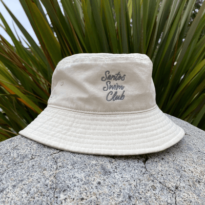 Unstructured ivory bucket hat with grey script embroidery Santos Swim Club